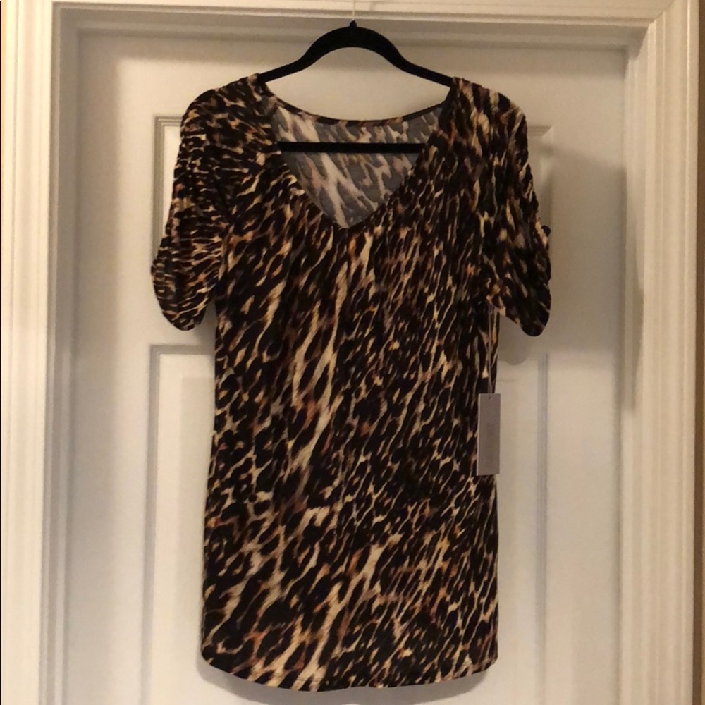 Jennifer Lopez animal print V-neck blouse